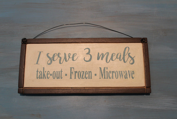 Wall sign I serve  meals